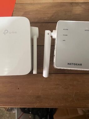 2 WIFI extenders-Netgear and TP